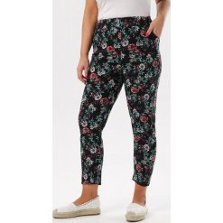 Czarne Spodnie Arrixie. Czarne jeansy damskie Born2be, xl, bez wzorów. W wyprzedaży za 29,99 zł.