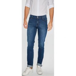 Trussardi Jeans - Jeansy. Niebieskie jeansy męskie z dziurami marki Trussardi Jeans. W wyprzedaży za 379,90 zł.