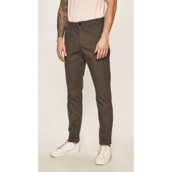 Tommy Hilfiger - Spodnie. Szare spodnie męskie TOMMY HILFIGER, na co dzień, bez wzorów, z elastanu, casualowe. Za 579,90 zł.