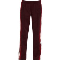 Spodnie dresowe damskie: adidas Originals ADIBREAK PANT Spodnie treningowe maroon
