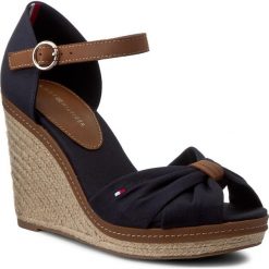 Espadryle TOMMY HILFIGER - Elena 56D FW0FW00905 Midnight 403. Niebieskie espadryle damskie TOMMY HILFIGER, bez wzorów, ze skóry, bez obcasa, na koturnie. W wyprzedaży za 269,00 zł.