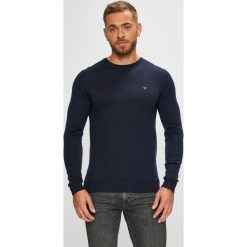 Guess Jeans - Sweter. Niebieskie swetry klasyczne damskie marki Guess Jeans, s, z aplikacjami, z wełny, z okrągłym kołnierzem. W wyprzedaży za 299,90 zł.