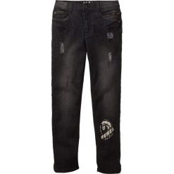 Dżinsy Relax Fit bonprix czarny "stone". Czarne spodnie chłopięce bonprix, z nadrukiem, z jeansu. Za 44,99 zł.