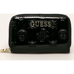 Guess Jeans - Portfel. Żółte portfele damskie Guess Jeans, z aplikacjami, z poliesteru. Za 139,90 zł.