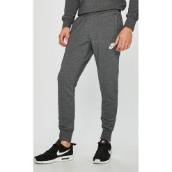 Nike Sportswear - Spodnie. Szare spodnie męskie marki Nike Sportswear, na co dzień, s, bez wzorów, z elastanu, sportowe. W wyprzedaży za 199,90 zł.