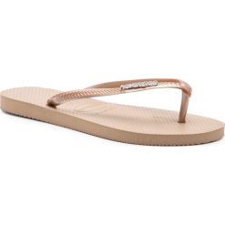 Japonki HAVAIANAS - Slim Logo Metallic 41198755282 Rose Gold/Rose Go. Żółte klapki damskie Havaianas, bez wzorów, z tworzywa sztucznego, bez obcasa. W wyprzedaży za 119,00 zł.