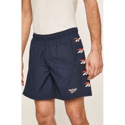 Reebok Classic - Szorty. Niebieskie spodenki sportowe męskie s, z nadrukiem, z poliesteru, sportowe. Za 159,90 zł.