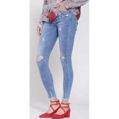 Niebieskie Jeansy Daisy Flower. Niebieskie jeansy damskie marki other. Za 94,99 zł.