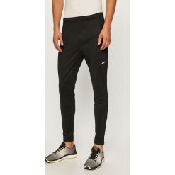 Reebok - Spodnie. Czarne spodnie męskie Reebok, na co dzień, s, bez wzorów, z poliesteru. Za 199,90 zł.