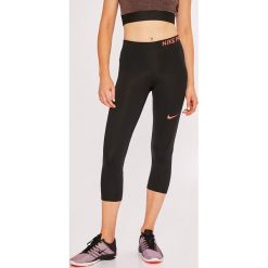 Nike - Legginsy. Czarne legginsy skórzane marki Nike, s. W wyprzedaży za 99,90 zł.