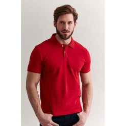 Koszulka polo w kolorze czerwonym. Czerwone koszulki męskie TATUUM, m, bez wzorów, z bawełny, polo, bez rękawów. W wyprzedaży za 79,95 zł.