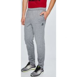 Reebok - Spodnie Thermowarm. Szare spodnie męskie Reebok, m, z poliesteru, sportowe. W wyprzedaży za 129,90 zł.