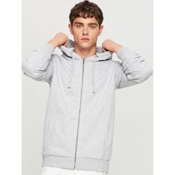 Bluza z kapturem - Jasny szar. Szare bejsbolówki męskie Reserved, l, z kapturem. Za 79,99 zł.