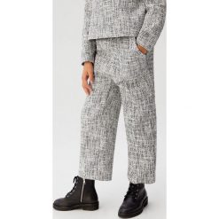 Mango Kids - Spodnie dziecięce Gema 110-164 cm. Białe spodnie dziewczęce Mango Kids, bez wzorów, z bawełny, casualowe. Za 79,90 zł.