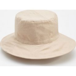 Lniany kapelusz - Beżowy. Brązowe kapelusze damskie marki Reserved, bez wzorów, ze lnu. Za 79,99 zł.