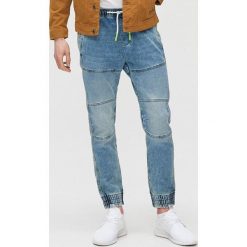Jeansowe joggery slouchy - Niebieski. Niebieskie spodnie męskie Cropp, m, z jeansu. Za 149,99 zł.