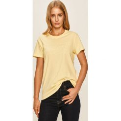 Levi's - T-shirt. Żółte bluzki damskie Levi's®, s, z nadrukiem, z bawełny, casualowe, z okrągłym kołnierzem. W wyprzedaży za 114,90 zł.