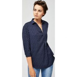 Koszula typu oversize. Koszule damskie Moodo, s, bez wzorów, bez kołnierzyka, bez rękawów. Za 29,99 zł.