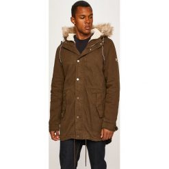 Tommy Jeans - Kurtka. Żółte płaszcze męskie Tommy Jeans, xl, bez wzorów, z bawełny, długie, z kapturem. W wyprzedaży za 729,90 zł.