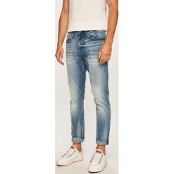 Calvin Klein Jeans - Jeansy. Niebieskie jeansy męskie Calvin Klein Jeans, z aplikacjami. W wyprzedaży za 399,90 zł.