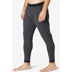 Spodnie dresowe Skinny Gym & Pilates 900 męskie. Szare spodnie męskie DOMYOS, m, bez wzorów, z elastanu. Za 119,99 zł.