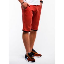 Krótkie spodenki męskie chino W150 - pomarańczowe. Pomarańczowe spodenki i szorty męskie Ombre Clothing, s, bez wzorów, z bawełny, klasyczne, krótkie. Za 39,00 zł.