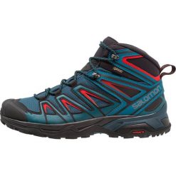 Salomon X ULTRA 3 MID GTX Buty trekkingowe reflecting pond/deep lagoon/high risk red. Zielone buty sportowe męskie marki Salomon, z tworzywa sztucznego, bez zapięcia, outdoorowe. Za 719,00 zł.