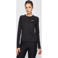 Nike - Bluza. Czarne bluzy damskie Nike, l, bez wzorów, z poliesteru, bez rękawów, bez kaptura. Za 179,90 zł.