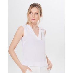 Top z błyszczącą lamówką - Biały. Białe topy damskie Mohito, xl, bez wzorów, bez kołnierzyka. W wyprzedaży za 39,99 zł.