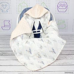 Kocyk do nosidła samochodowego Łapacz Snów. Białe kombinezony niemowlęce marki Pakamera. Za 139,00 zł.