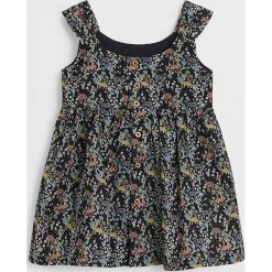 Mango Kids - Sukienka dziecięca Naif 80-104 cm. Czarne sukienki dziewczęce Mango Kids, bez wzorów, z bawełny, bez rękawów, rozkloszowane. W wyprzedaży za 79,90 zł.