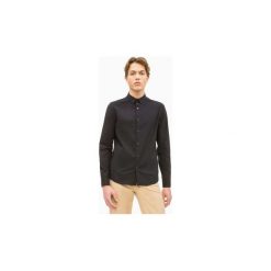 Koszule z długim rękawem Calvin Klein Jeans J30J312439 SLIM STRETCH. Czarne koszule męskie Calvin Klein Jeans, s, bez wzorów, z jeansu, bez kołnierzyka, z długim rękawem. Za 274,25 zł.