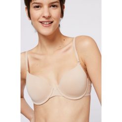 Etam - Biustonosz Pure Fit. Białe biustonosze Etam, z haftami, z elastanu. W wyprzedaży za 99,90 zł.