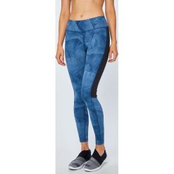 Reebok - Legginsy. Niebieskie legginsy skórzane marki Reebok, s. W wyprzedaży za 129,90 zł.