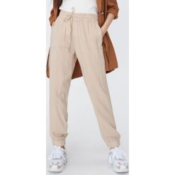 Spodnie joggery - Beżowy. Brązowe spodnie damskie Sinsay, s. Za 39,99 zł.