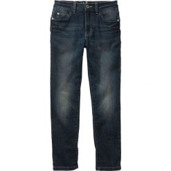 Dżinsy Slim Fit bonprix dirty denim. Niebieskie spodnie chłopięce marki bonprix, bez wzorów, z jeansu, klasyczne. Za 79,99 zł.