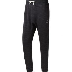 EL MARBLE GROUP PAN BLACK. Czarne spodnie męskie marki Reebok, na co dzień, na jesień, m, bez wzorów, z bawełny, sportowe. Za 129,99 zł.
