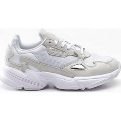 Sneakersy skórzane białe Adidas Falcon W B28128 - biały. Białe buty sportowe damskie Adidas, bez wzorów, sportowe. Za 399,99 zł.