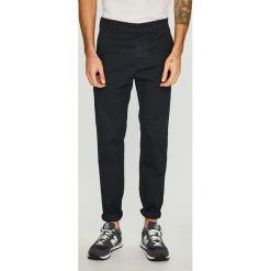 G-Star Raw - Spodnie. Niebieskie spodnie męskie G-Star RAW, na co dzień, bez wzorów, z elastanu, retro. W wyprzedaży za 339,90 zł.