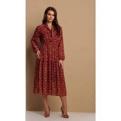 Brązowa Sukienka Glysanya. Pomarańczowe sukienki damskie Renee, s, bez wzorów, bez kołnierzyka, bez rękawów, midi. Za 129,99 zł.