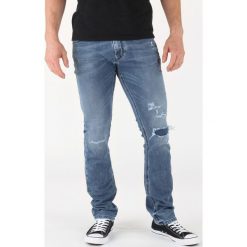Diesel Thavar-Ne Dżinsy Niebieski. Niebieskie jeansy męskie Diesel, bez wzorów. Za 1162,95 zł.