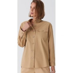Koszula oversize - Beżowy. Brązowe koszule damskie House, s, bez wzorów, bez kołnierzyka, bez rękawów. Za 99,99 zł.