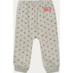 GAP - Spodnie dziecięce 50-74 cm. Szare spodnie dziewczęce GAP, bez wzorów, z bawełny. Za 79,90 zł.