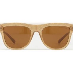 Michael Kors - Okulary St. Kitts. Żółte okulary przeciwsłoneczne damskie marki Michael Kors. W wyprzedaży za 399,90 zł.