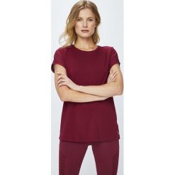 Reebok - Top Mesh Panel. Brązowe topy damskie marki Reebok, s, z elastanu, z okrągłym kołnierzem. W wyprzedaży za 89,90 zł.