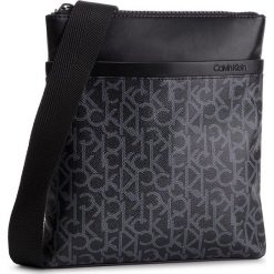 Saszetka CALVIN KLEIN - Ck Mono Flat Crossover K50K504348 910. Czarne saszetki damskie Calvin Klein, bez wzorów, ze skóry ekologicznej, młodzieżowe, bez dodatków. W wyprzedaży za 259,00 zł.