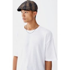 Koszulka z dzianiny dresowej. Różowe bluzy męskie marki Pull&Bear, m, bez wzorów, z dzianiny, bez kołnierzyka, bez rękawów, bez kaptura. Za 49,90 zł.