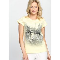 Żółty T-shirt Must Get Out. Żółte t-shirty damskie marki Born2be, xl. Za 19,99 zł.