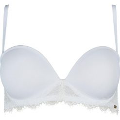 Biustonosz balkonetka w kolorze białym. Białe biustonosze Skiny Women & Men, w koronkowe wzory, z koronki. W wyprzedaży za 72,95 zł.
