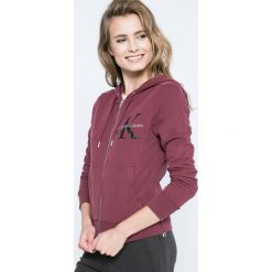 Calvin Klein Jeans - Bluza. Brązowe bluzy z kapturem damskie Calvin Klein Jeans, l, z bawełny. W wyprzedaży za 329,90 zł.